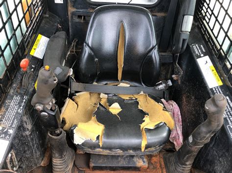 how to adjust seat in john deere skid steer|at327445.